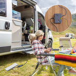 Load image into Gallery viewer, Starlink Mini 150W GigE Passive PoE Injector providing stable outdoor internet connection for RV camping, enabling seamless Starlink satellite connectivity for remote work and leisure.
