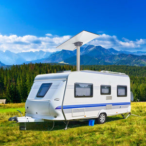 Mountain camping RV using Starlink Standard Pipe Adapter – A motorhome in a grassy mountain field, fitted with a Starlink dish and Starlink Standard Pipe Adapter to stay connected in remote areas.