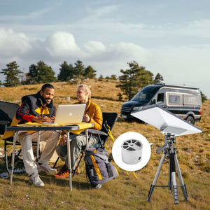 Couple working remotely outdoors with laptop using Starlink Mini Tripod Mount Adapter for stable satellite internet connection while camping in the mountains.